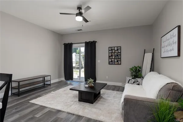 a living room with furniture and window