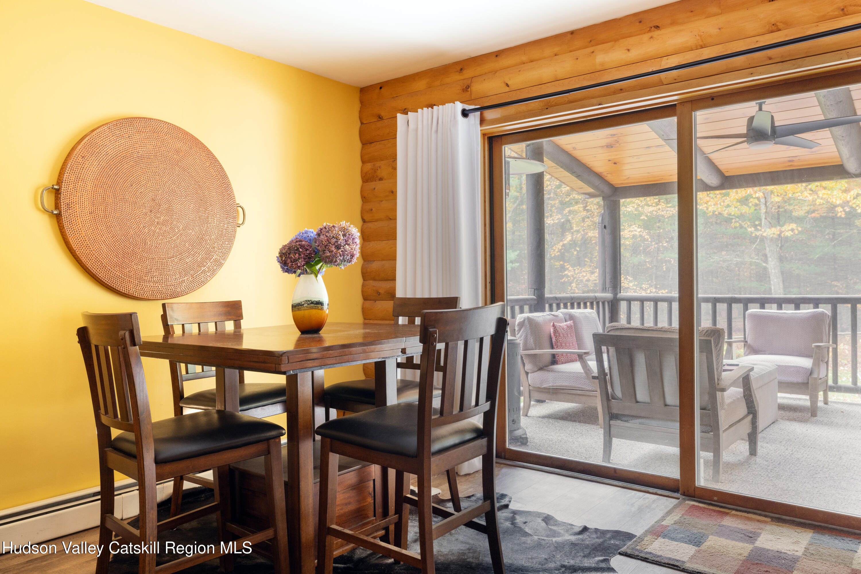 231 Decker Road Sparrowbush, NY 12780 - Photo 11 of 31 a view of a dining room with furniture and a window