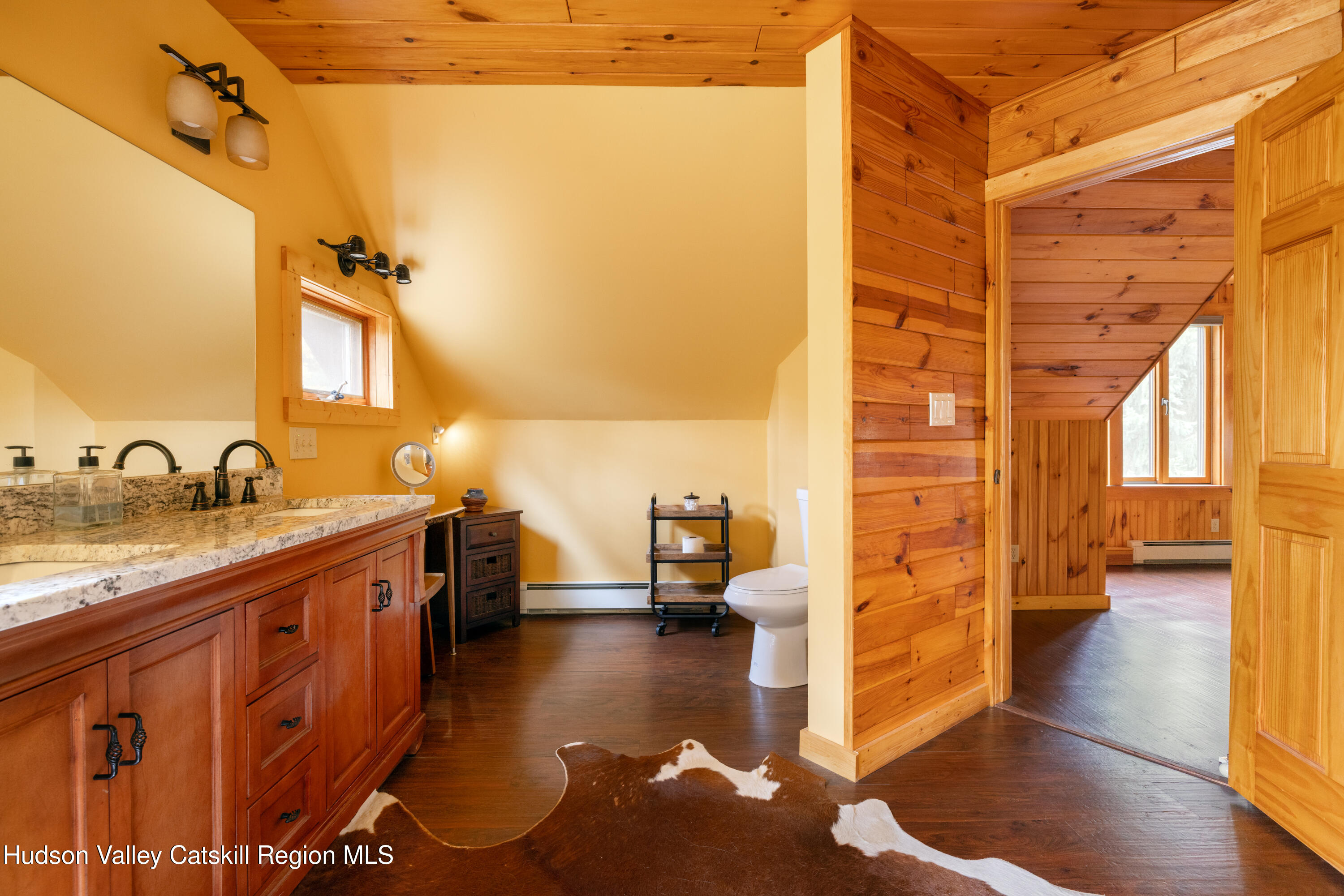 231 Decker Road Sparrowbush, NY 12780 - Photo 14 of 31 a view of a bathroom with sink and mirror