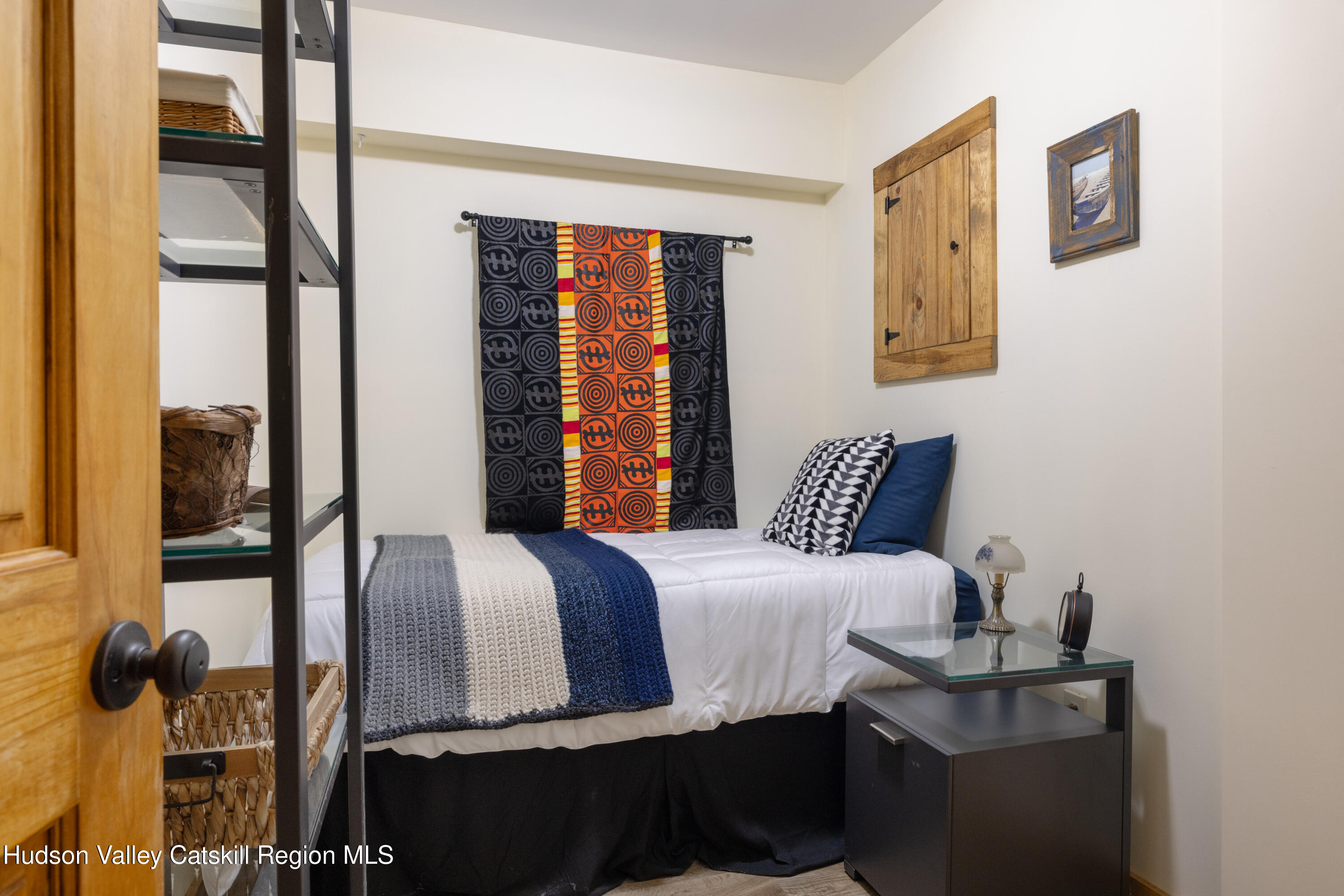 231 Decker Road Sparrowbush, NY 12780 - Photo 22 of 31 a bedroom with a bed and a window