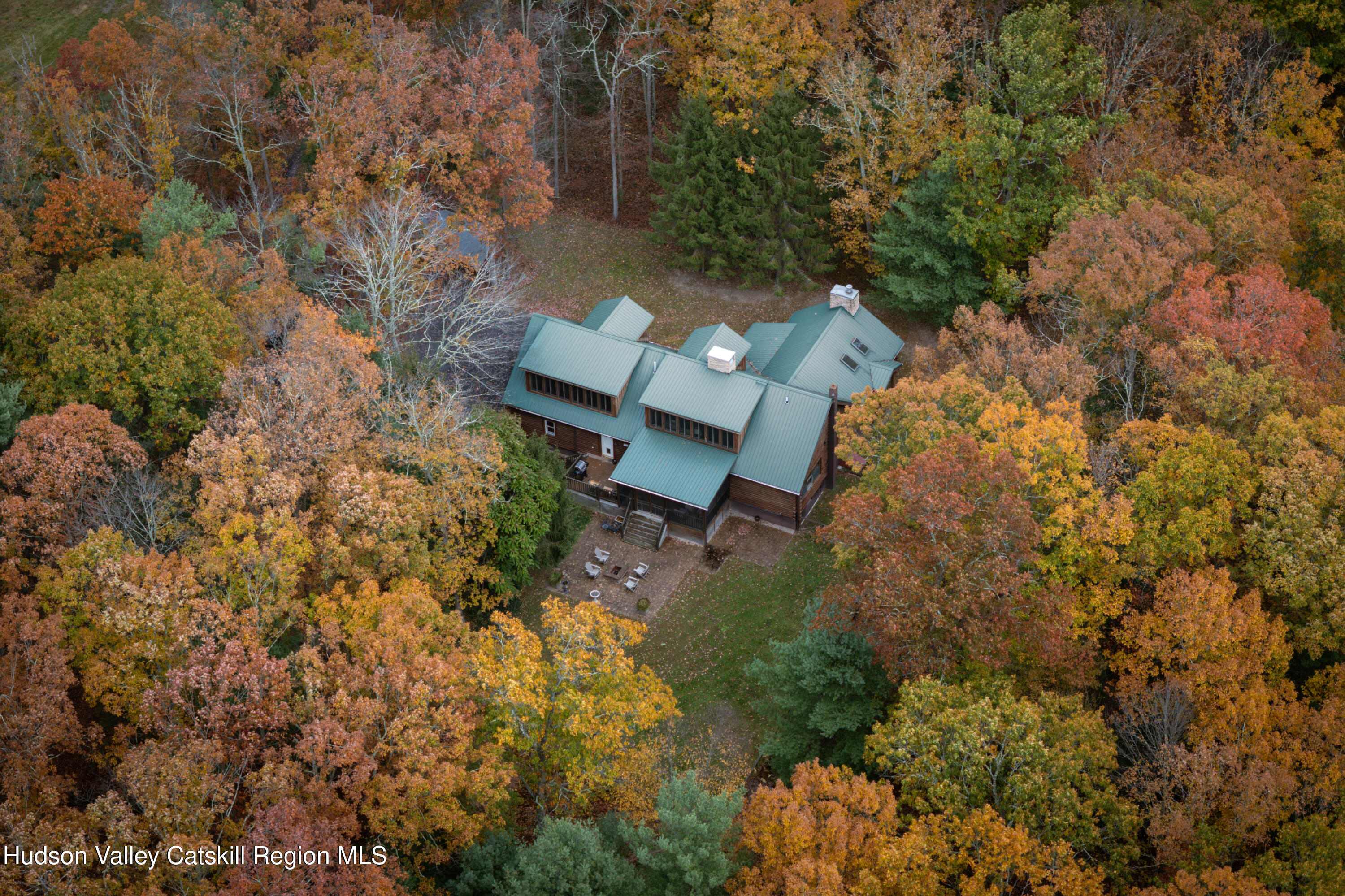 231 Decker Road Sparrowbush, NY 12780 - Photo 28 of 31 an aerial view of a house with a yard and garden
