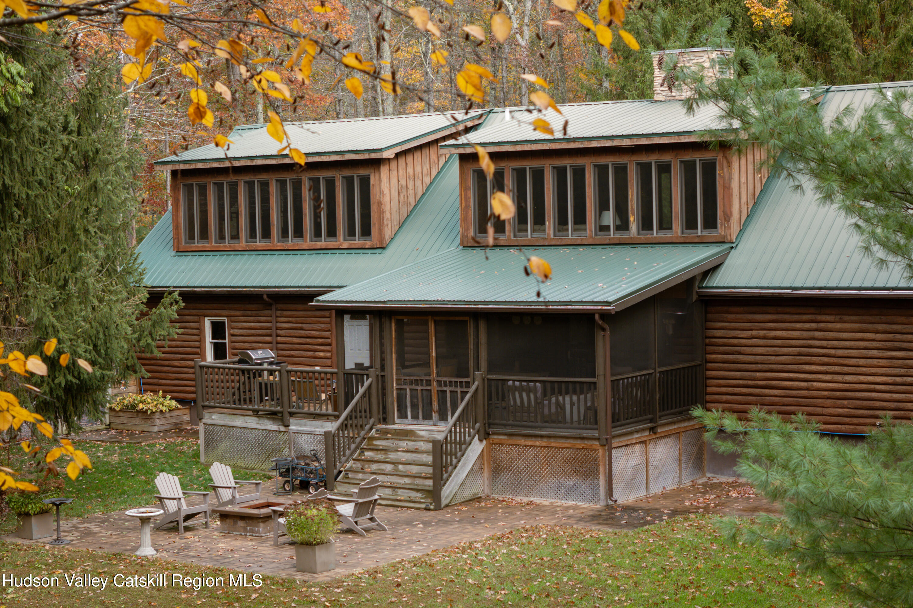 231 Decker Road Sparrowbush, NY 12780 - Photo 30 of 31 a view of a house with backyard and sitting area