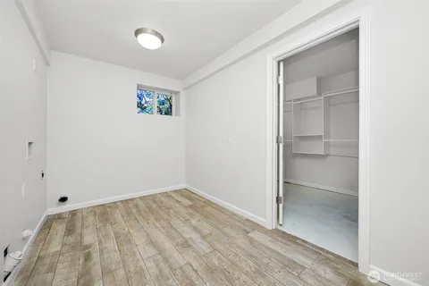 a view of a hallway with washer and dryer