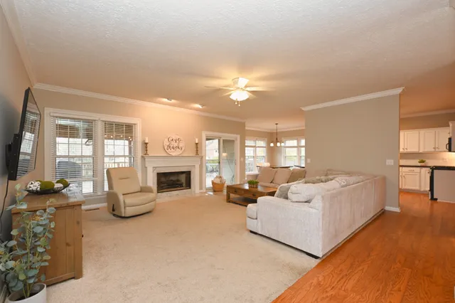 a very nice looking dining room with a large window