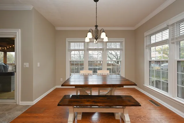 a bathroom with a tub shower and sink