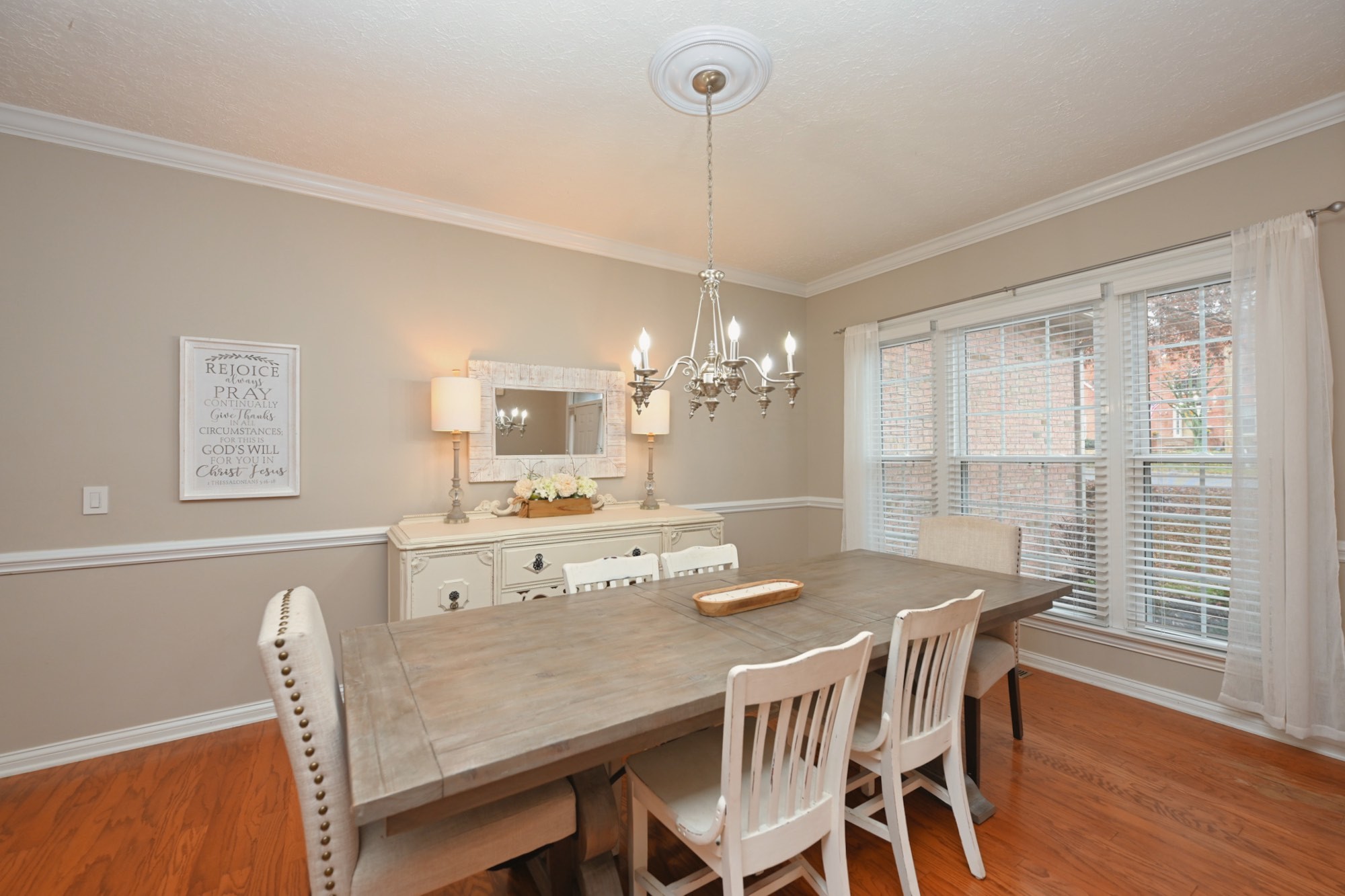 114 Wyncrest Way Hendersonville, TN 37075 - Photo 9 of 40 a view of a dining room and livingroom with furniture wooden floor a chandelier