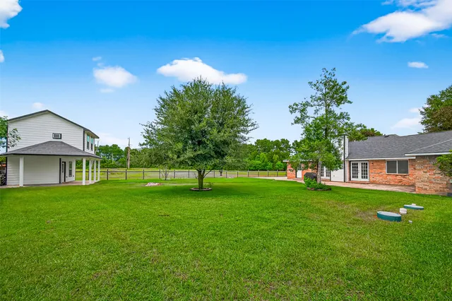 a house view with a garden space