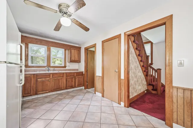 a view of a hallway with windows