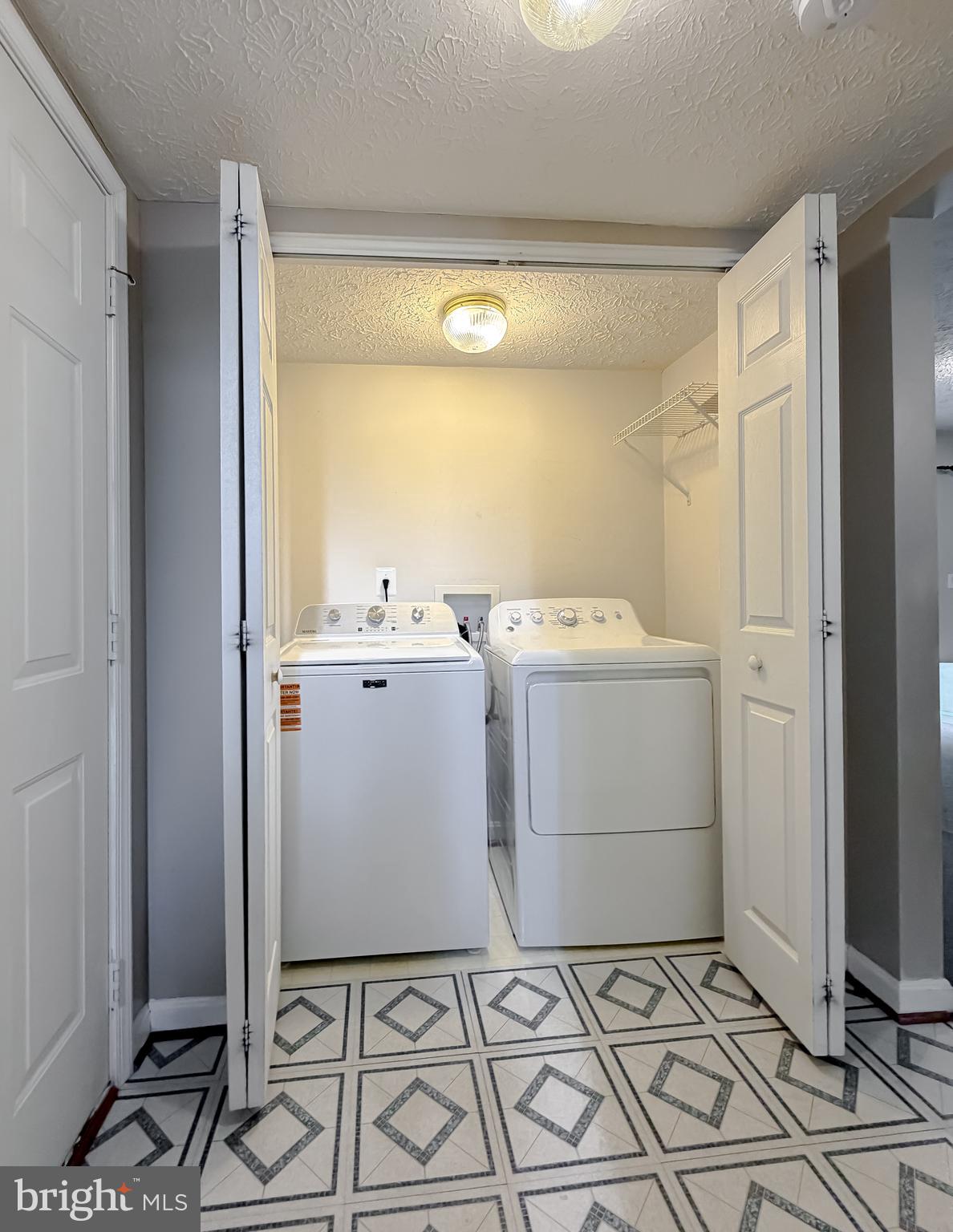 23801 McIntosh Road Hollywood, MD 20636 - Photo 30 of 35 a utility room with a washer and dryer