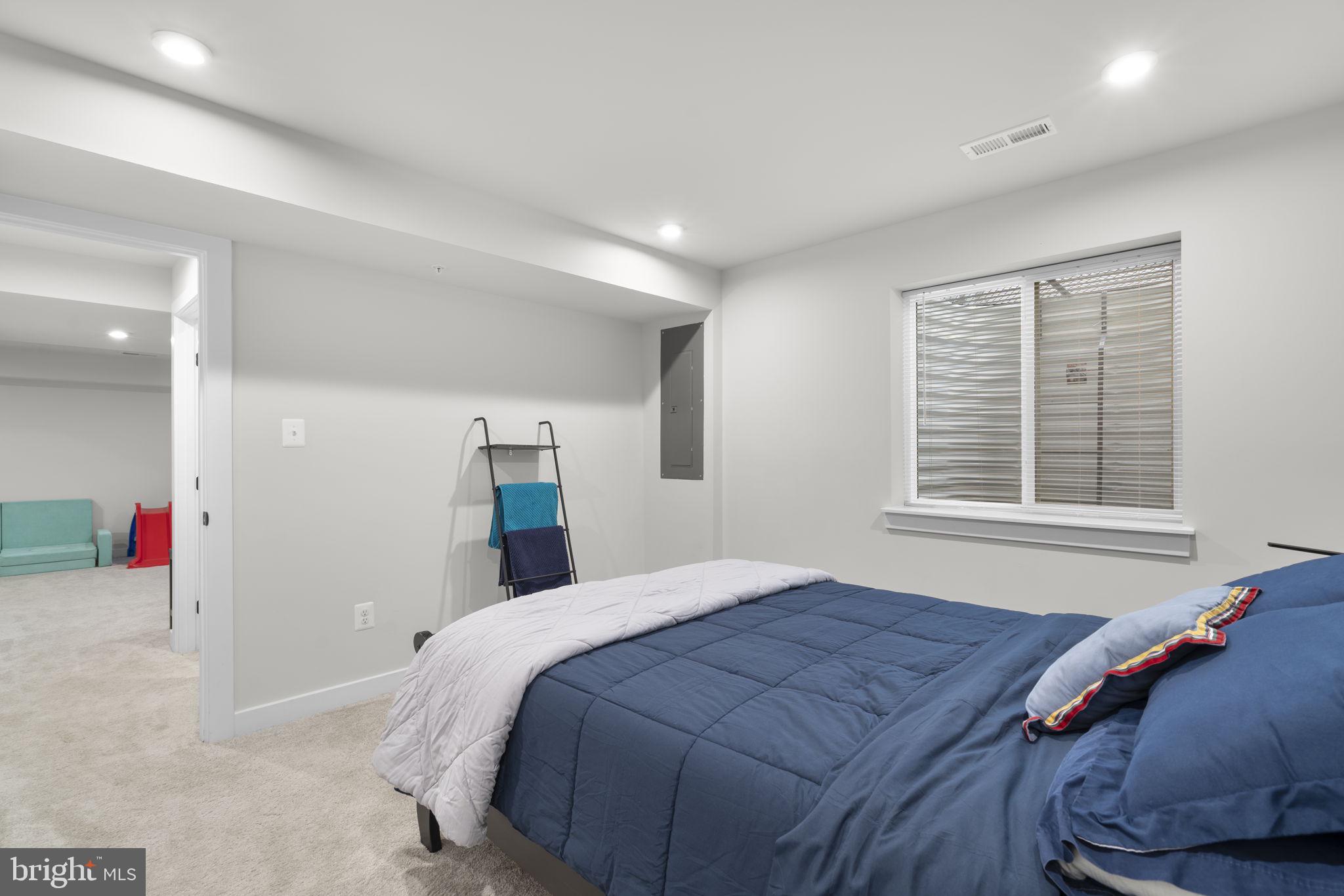 1713 Aurora Way Frederick, MD 21702 - Photo 51 of 57 a bedroom with a bed and a window