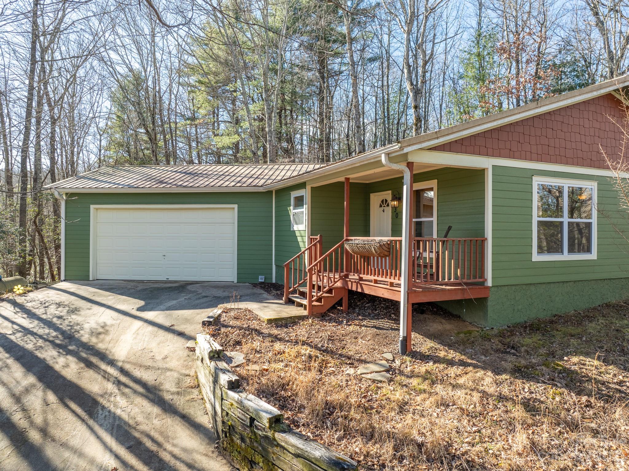 430 Jeep Road Brevard, NC 28712 - Photo 12 of 45 a view of a house with backyard
