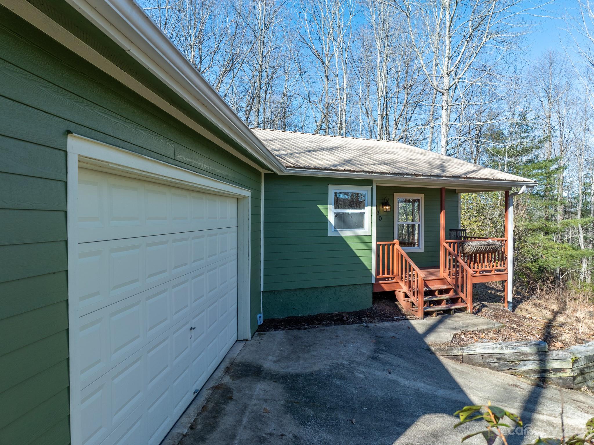 430 Jeep Road Brevard, NC 28712 - Photo 2 of 45 a backyard of a house with outdoor seating