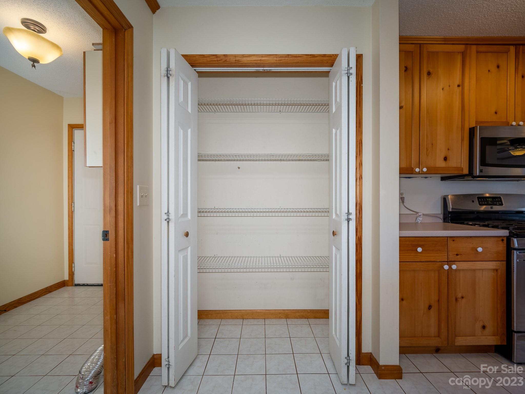 430 Jeep Road Brevard, NC 28712 - Photo 24 of 45 a view of walk in closet with empty room