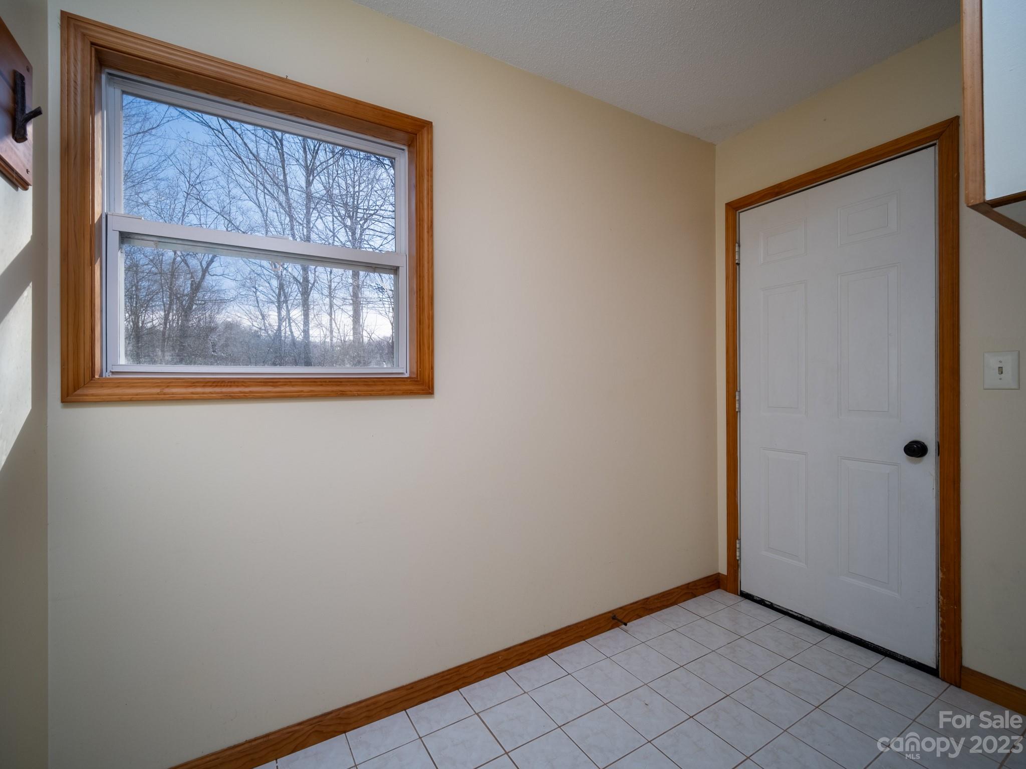 430 Jeep Road Brevard, NC 28712 - Photo 26 of 45 a view of a small space with wooden floor and a window