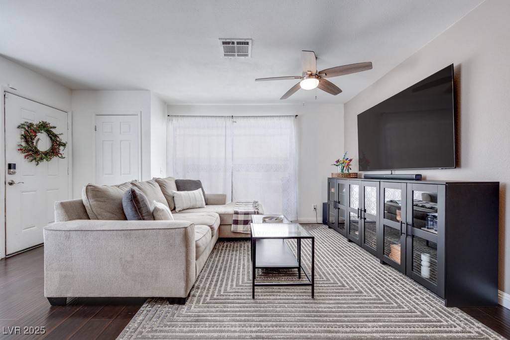 6444 Peartree Road Las Vegas, NV 89108 - Photo 9 of 33 Bright and airy living room with backyard access and lots of natural light