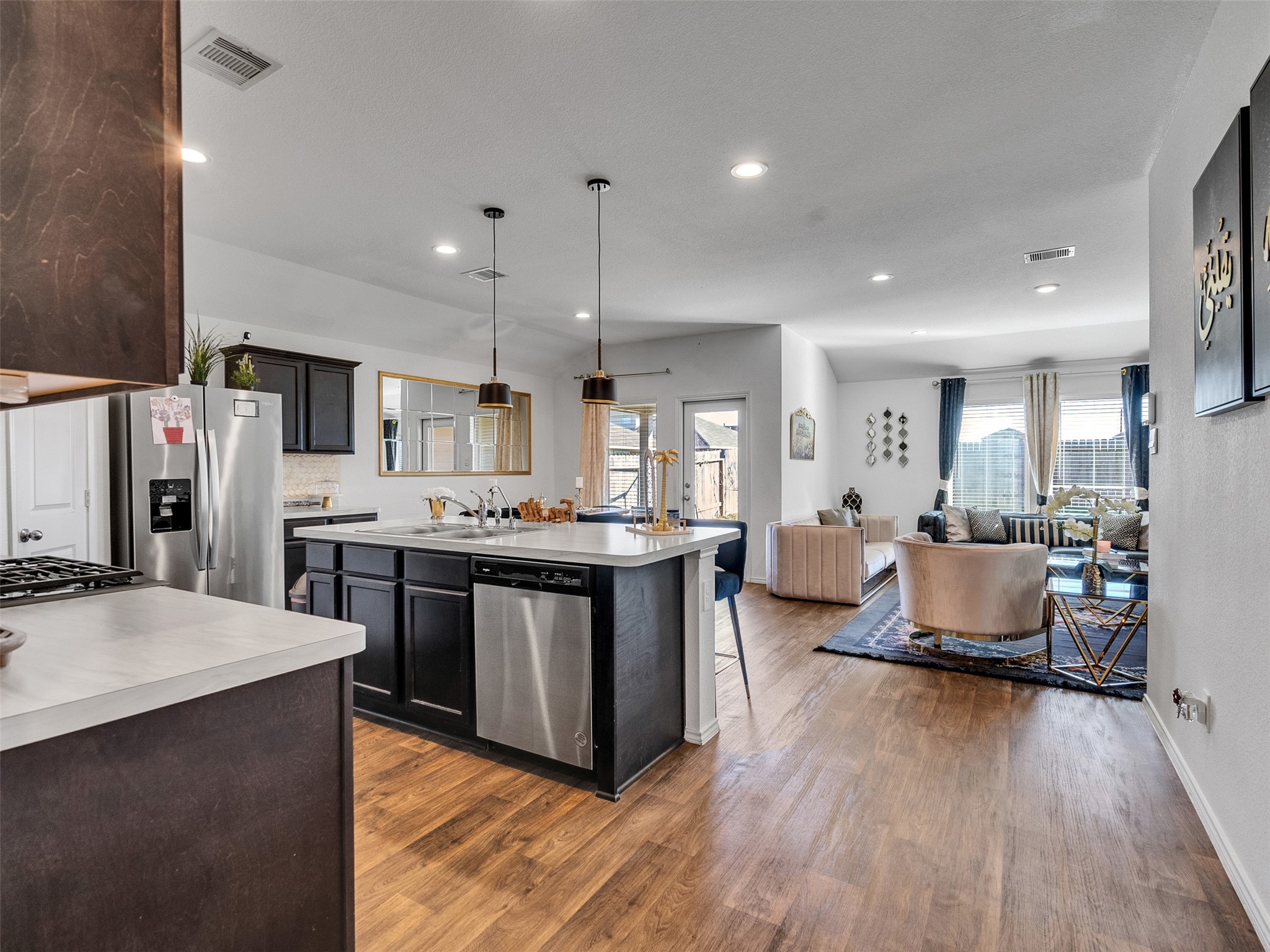 21215 Audubon Russet Road Katy, TX 77449 - Photo 12 of 30 a large kitchen with a table and chairs