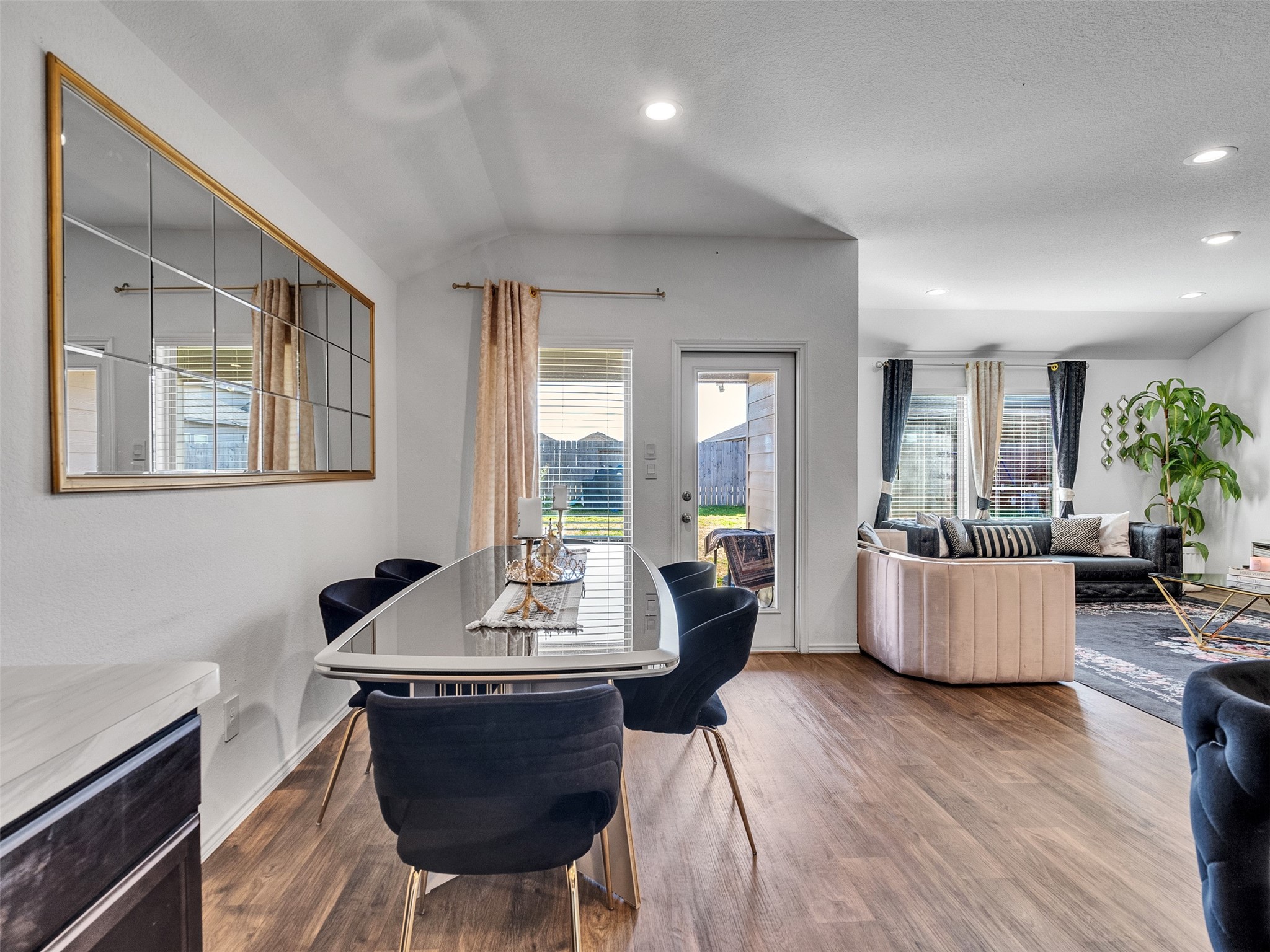 21215 Audubon Russet Road Katy, TX 77449 - Photo 16 of 30 a living room with furniture and a couch
