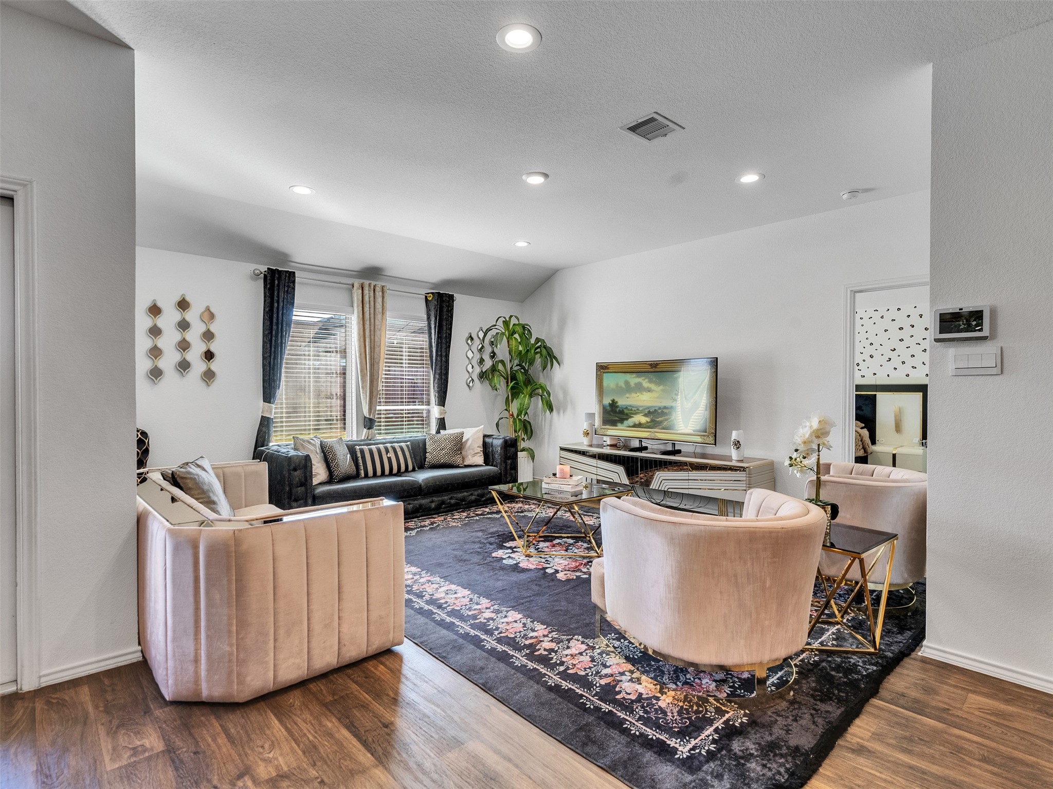 21215 Audubon Russet Road Katy, TX 77449 - Photo 17 of 30 a living room with furniture and a flat screen tv