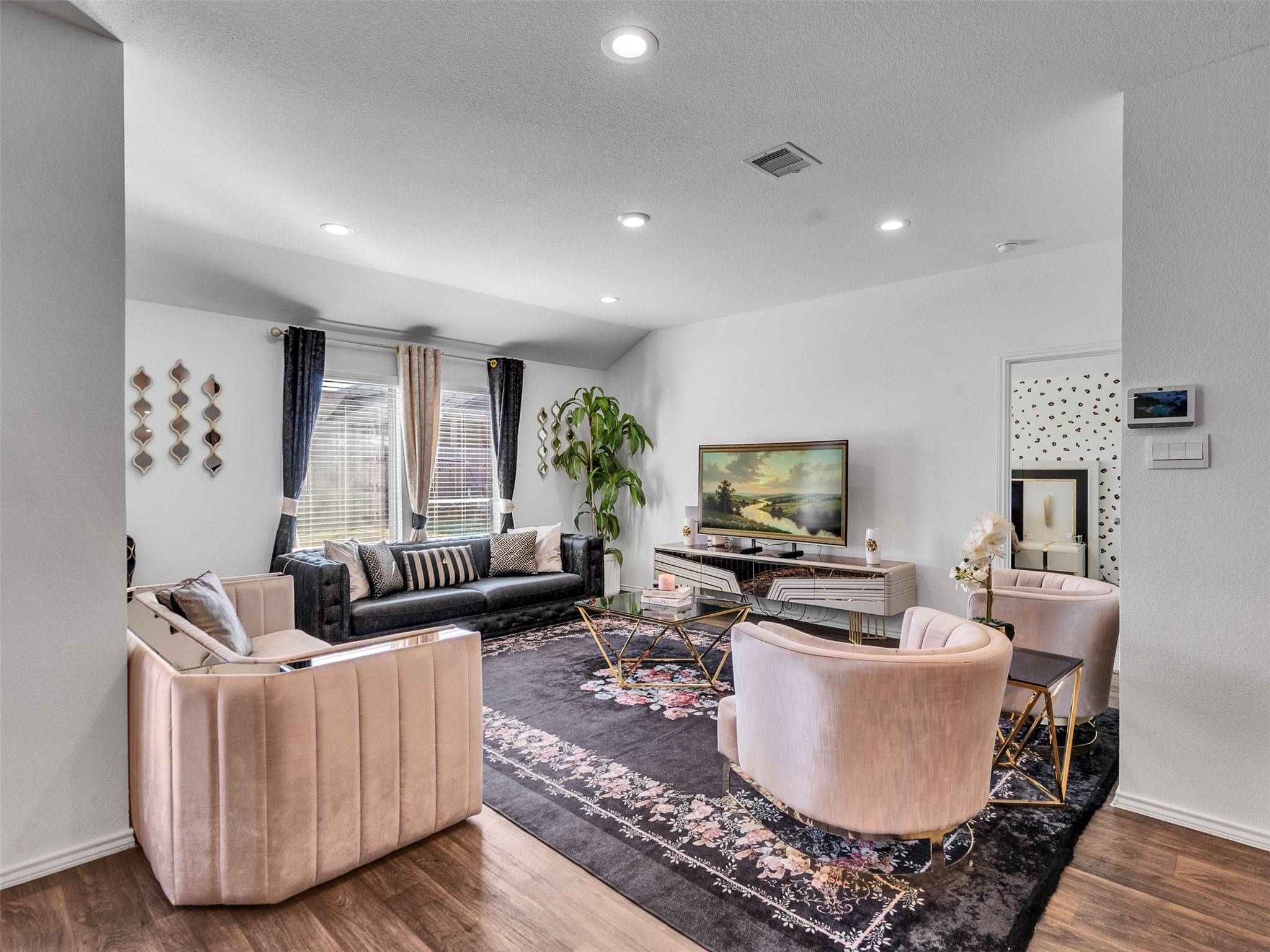 21215 Audubon Russet Road Katy, TX 77449 - Photo 19 of 30 a living room with furniture and a flat screen tv