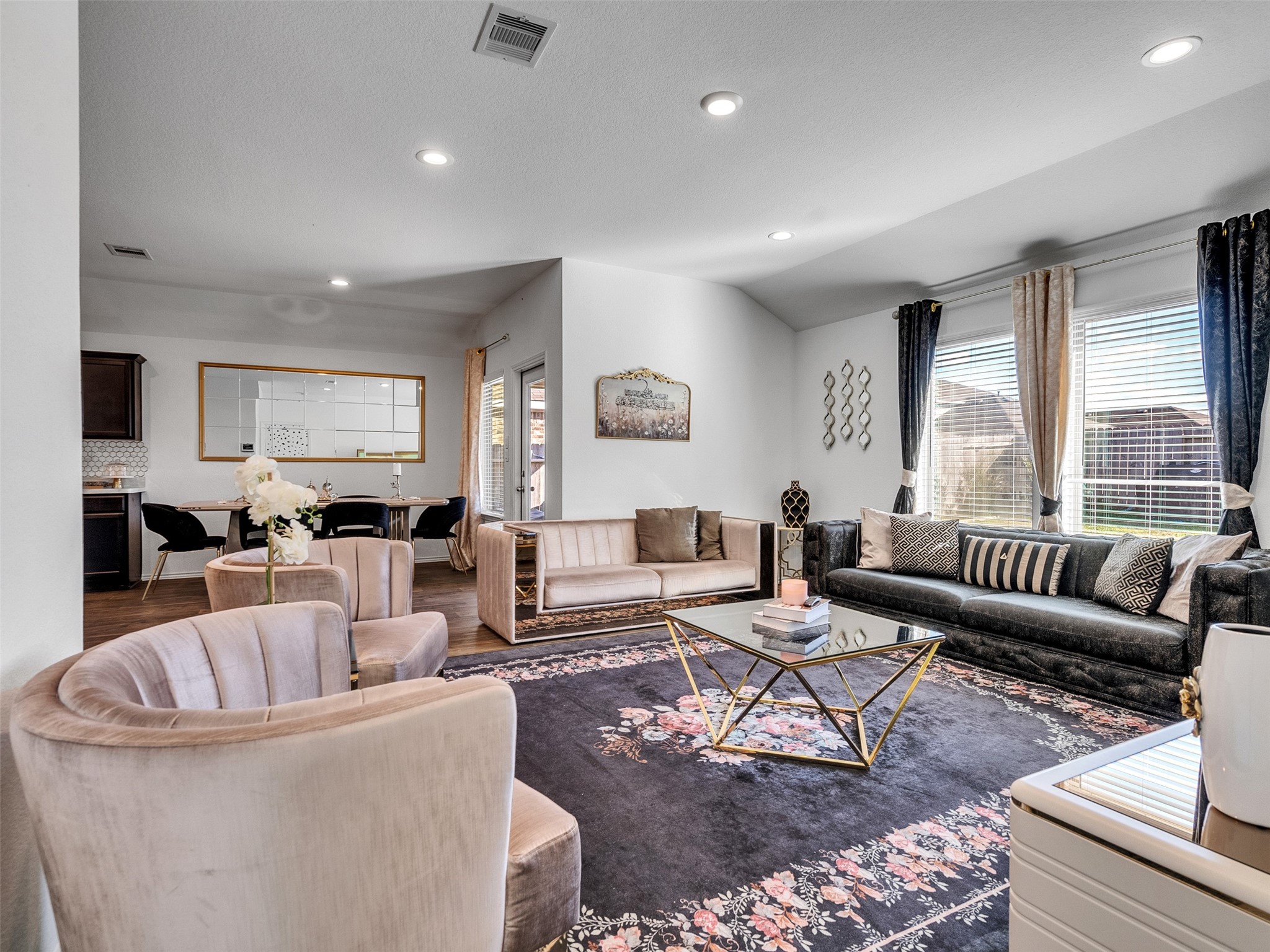 21215 Audubon Russet Road Katy, TX 77449 - Photo 20 of 30 a living room with furniture wooden floor and a large window