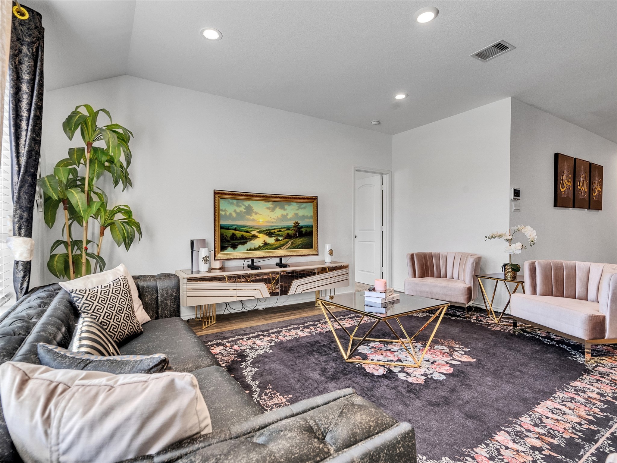 21215 Audubon Russet Road Katy, TX 77449 - Photo 21 of 30 a living room with furniture and a flat screen tv
