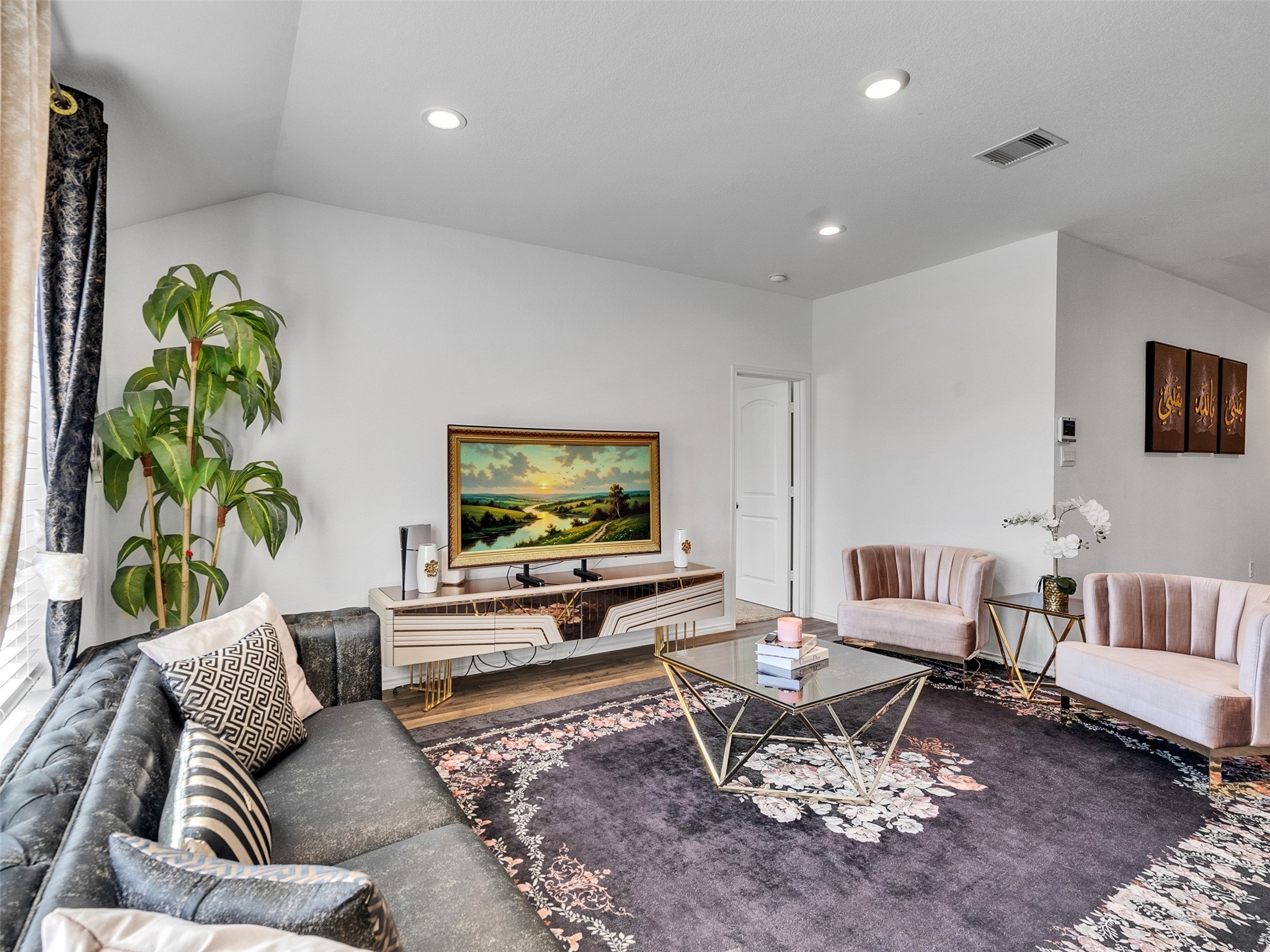 21215 Audubon Russet Road Katy, TX 77449 - Photo 22 of 30 a living room with furniture and a flat screen tv