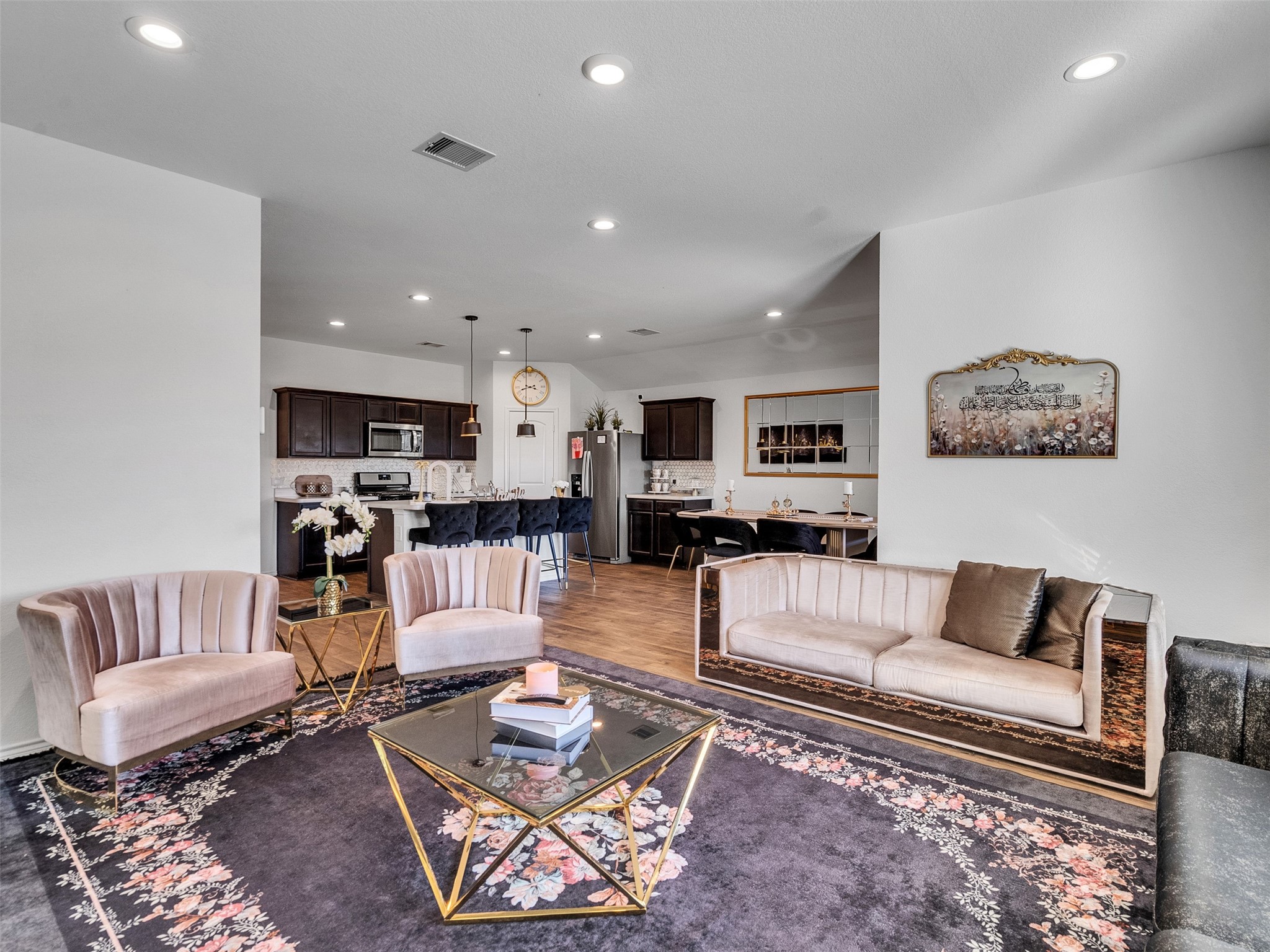 21215 Audubon Russet Road Katy, TX 77449 - Photo 23 of 30 a living room with furniture and kitchen view