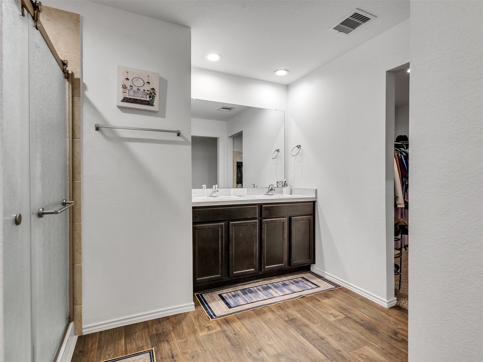 21215 Audubon Russet Road Katy, TX 77449 - Photo 26 of 30 a bathroom with a sink and a mirror