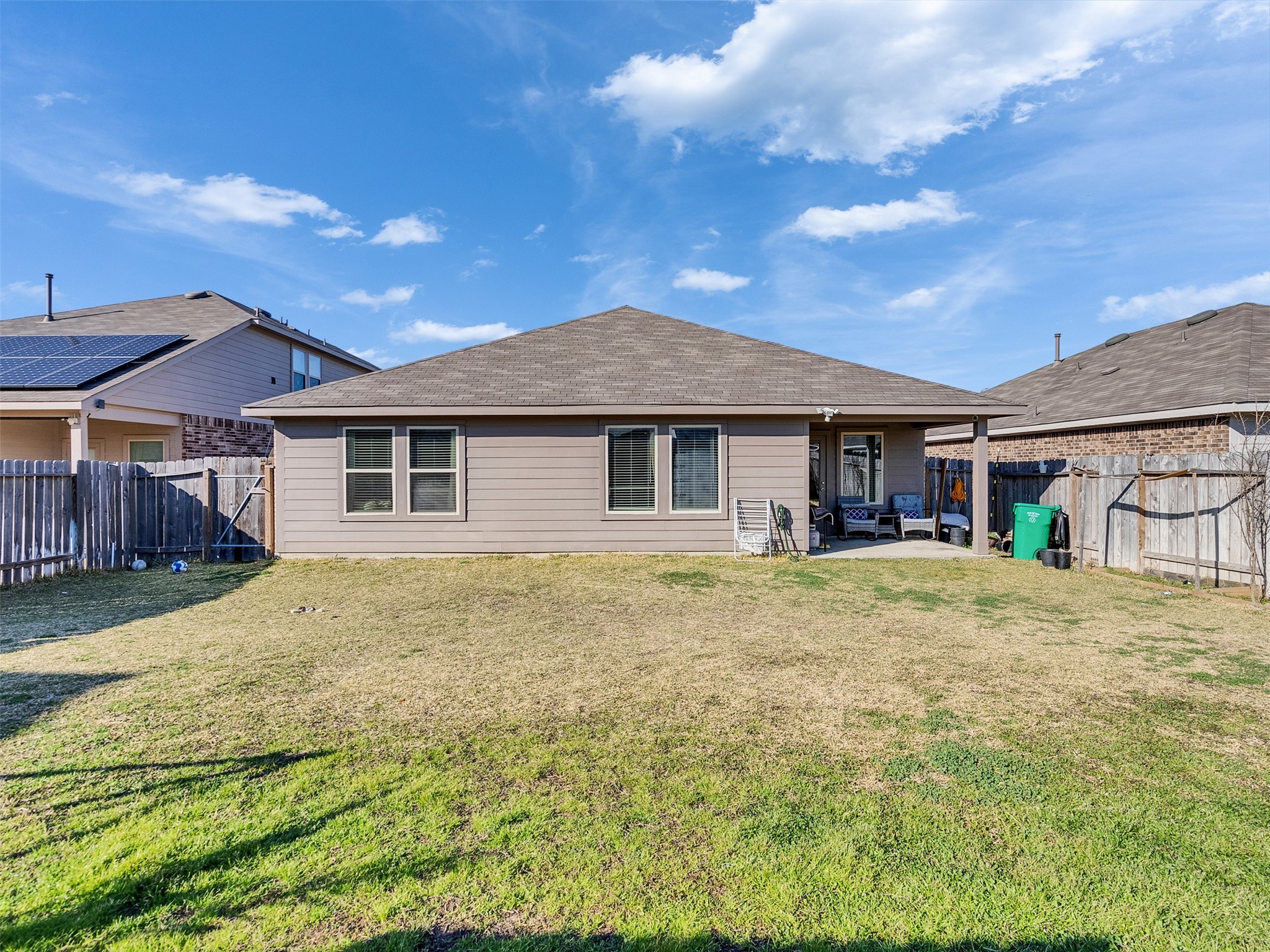 21215 Audubon Russet Road Katy, TX 77449 - Photo 30 of 30 a front view of a house with a garden