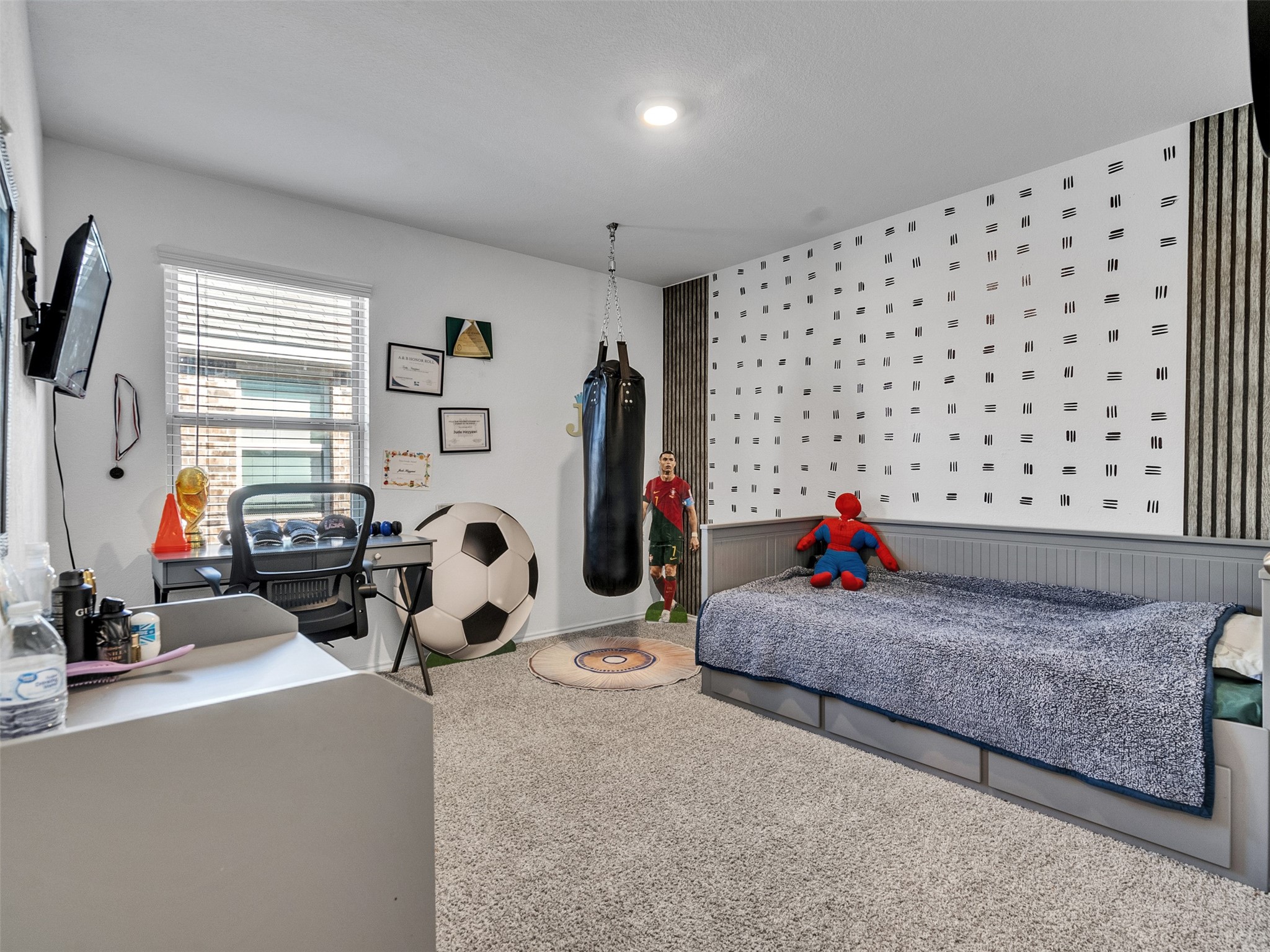 21215 Audubon Russet Road Katy, TX 77449 - Photo 5 of 30 a living room with furniture a window and gym equipment