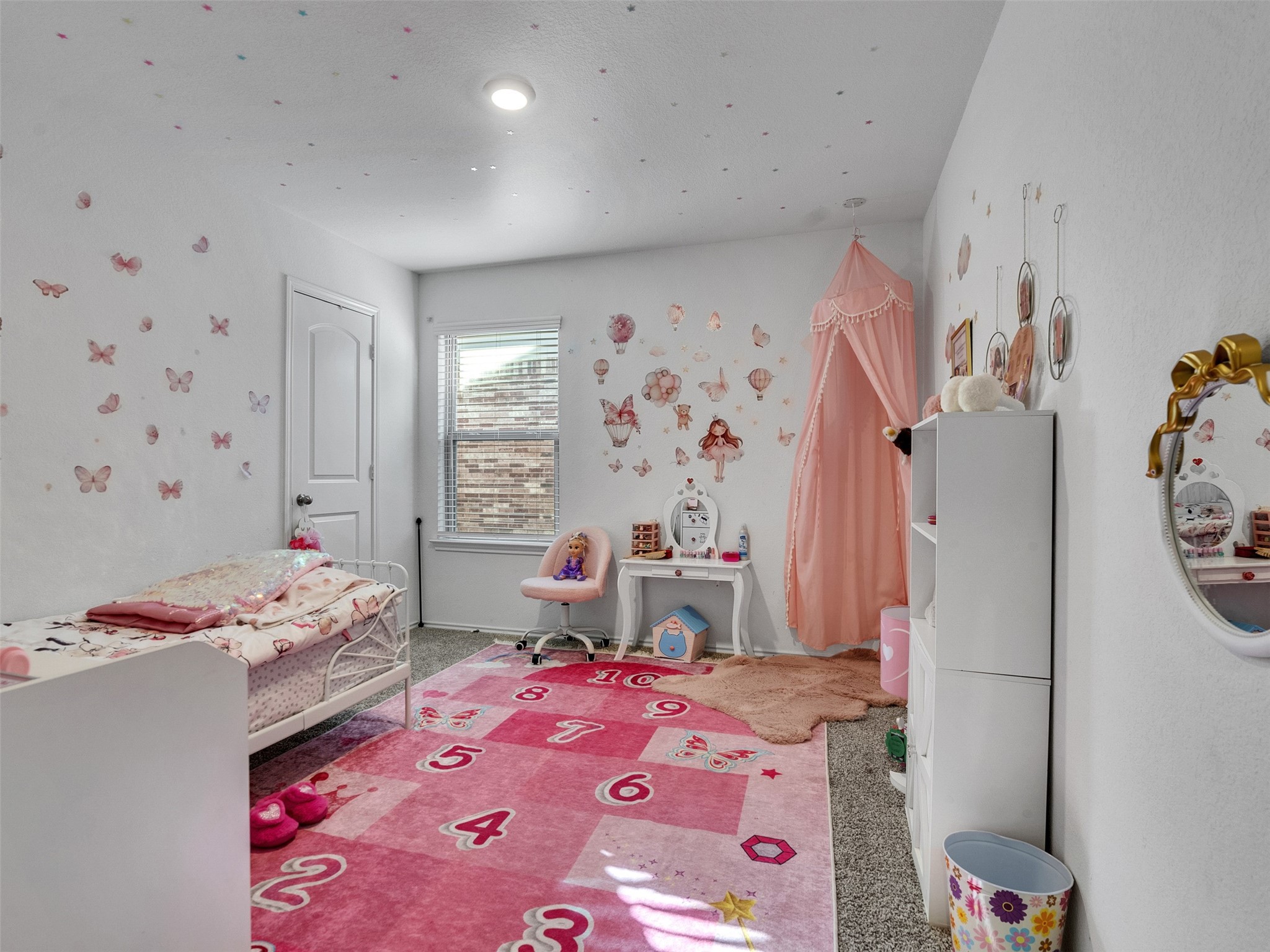 21215 Audubon Russet Road Katy, TX 77449 - Photo 7 of 30 a bedroom with a bed and a window