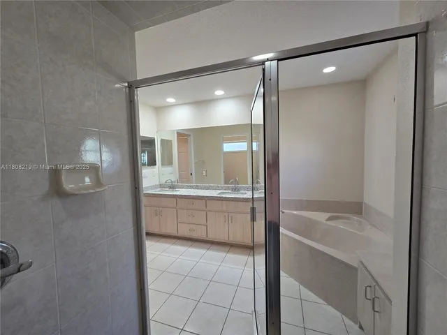 a bathroom with a shower and toilet