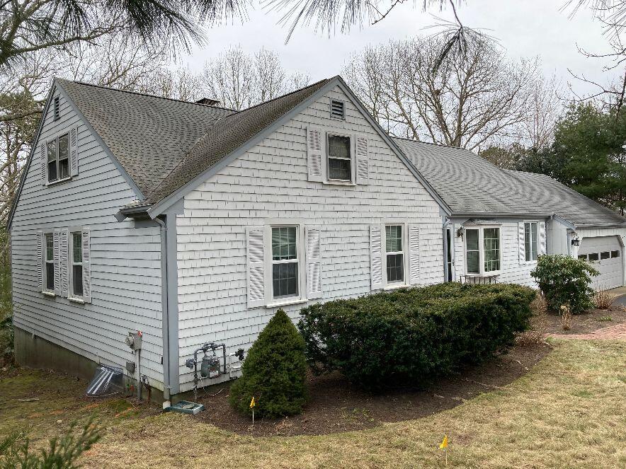 316 Cap'n Lijah's Road Centerville, MA 02632 - Photo 3 of 45 a view of a house with a yard