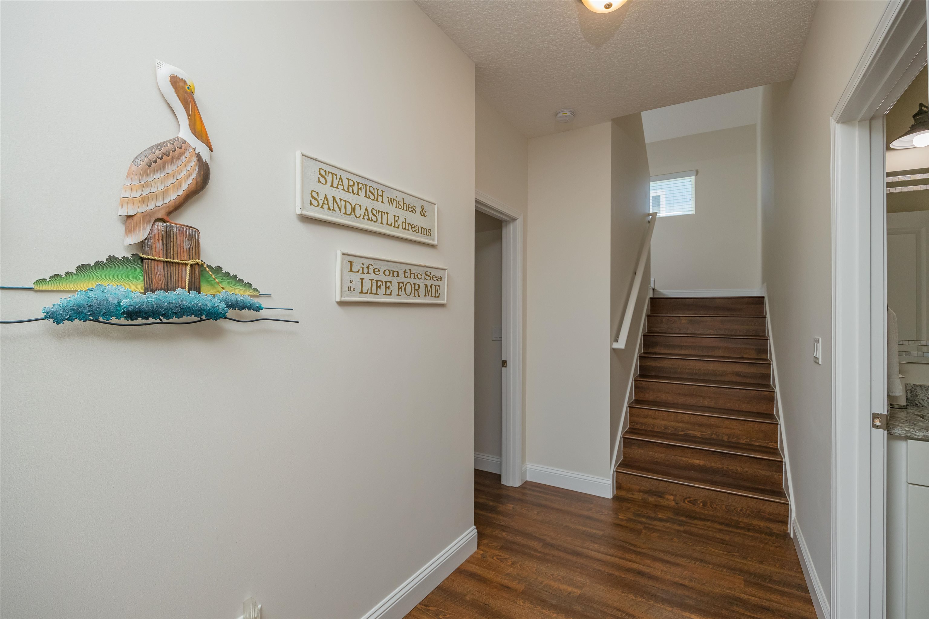 6832 Middleton Avenue St. Augustine, FL 32080 - Photo 31 of 47 a view of a hallway with wooden floor and entryway