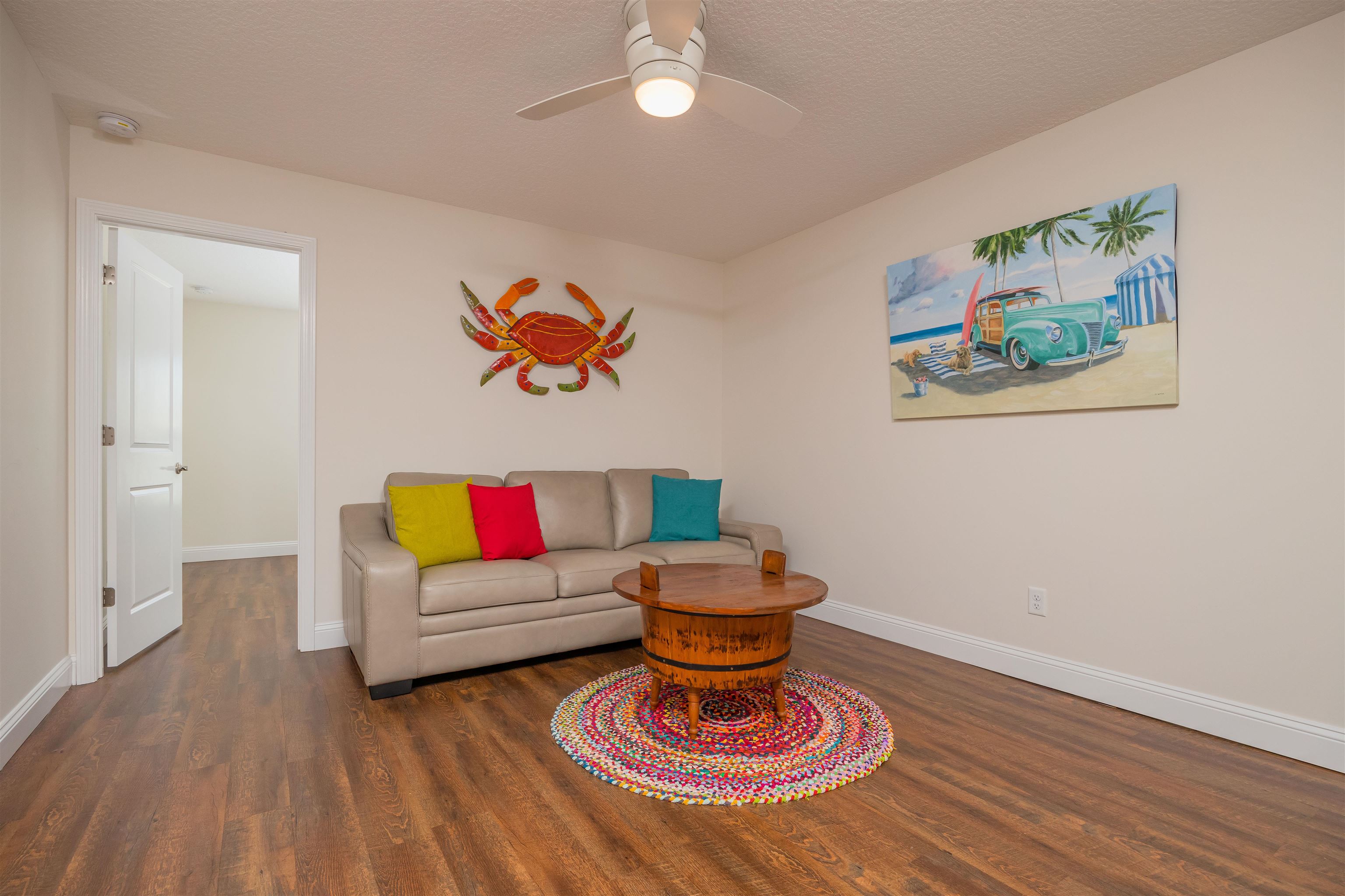 6832 Middleton Avenue St. Augustine, FL 32080 - Photo 38 of 47 a living room with furniture and a wooden floor
