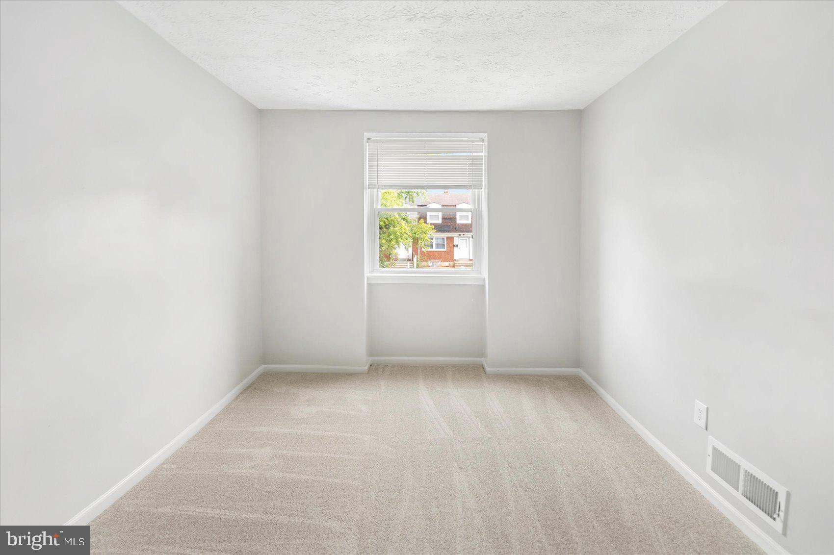 36 Bladen Road Essex, MD 21221 - Photo 24 of 34 an empty room with a window