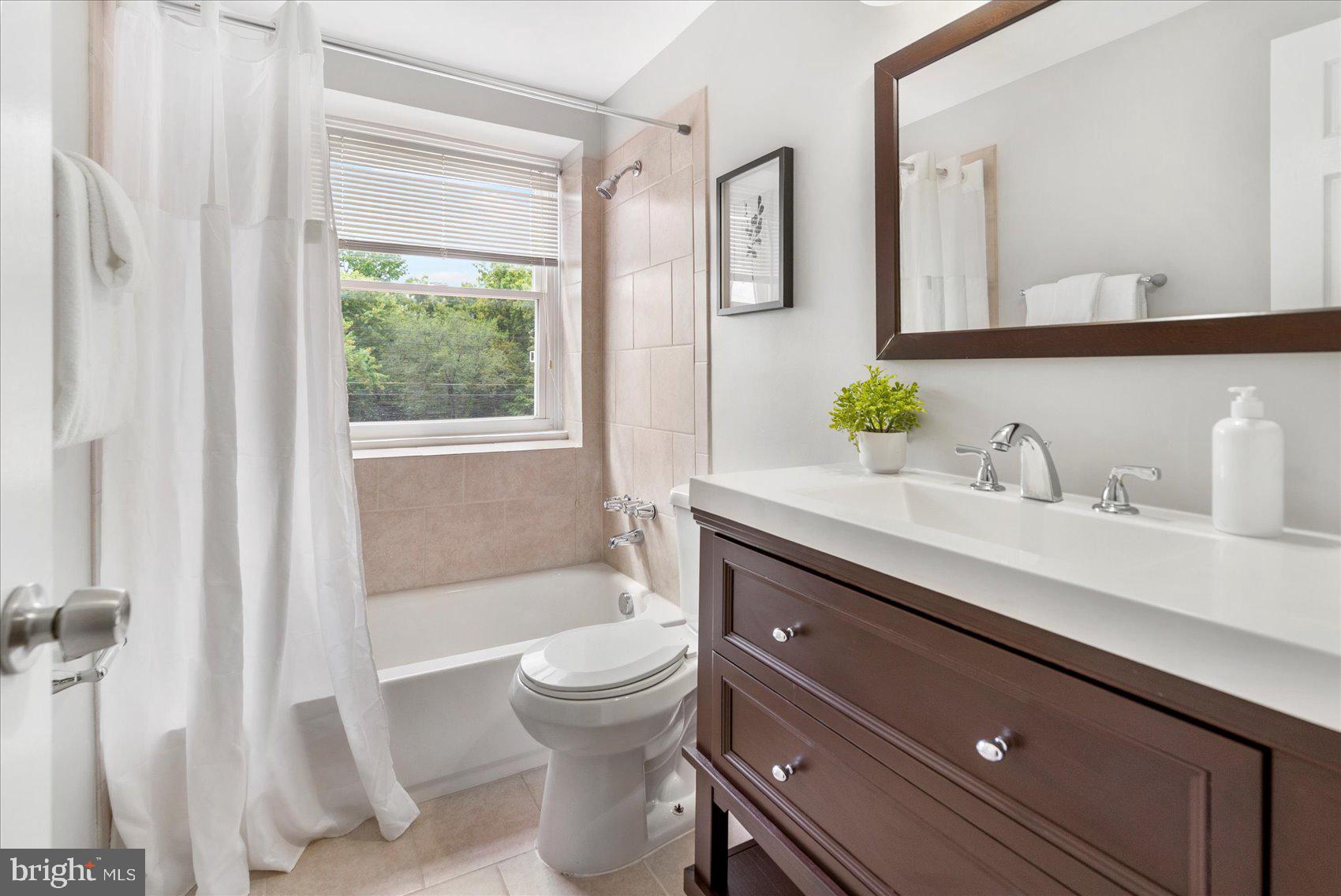 36 Bladen Road Essex, MD 21221 - Photo 28 of 34 a bathroom with a sink toilet and shower