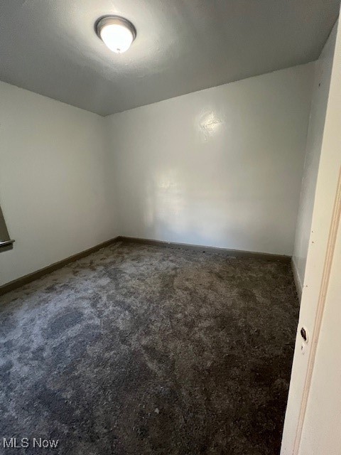 1842 Colonnade Road Cleveland, OH 44112 - Photo 6 of 47 Empty room with dark carpet
