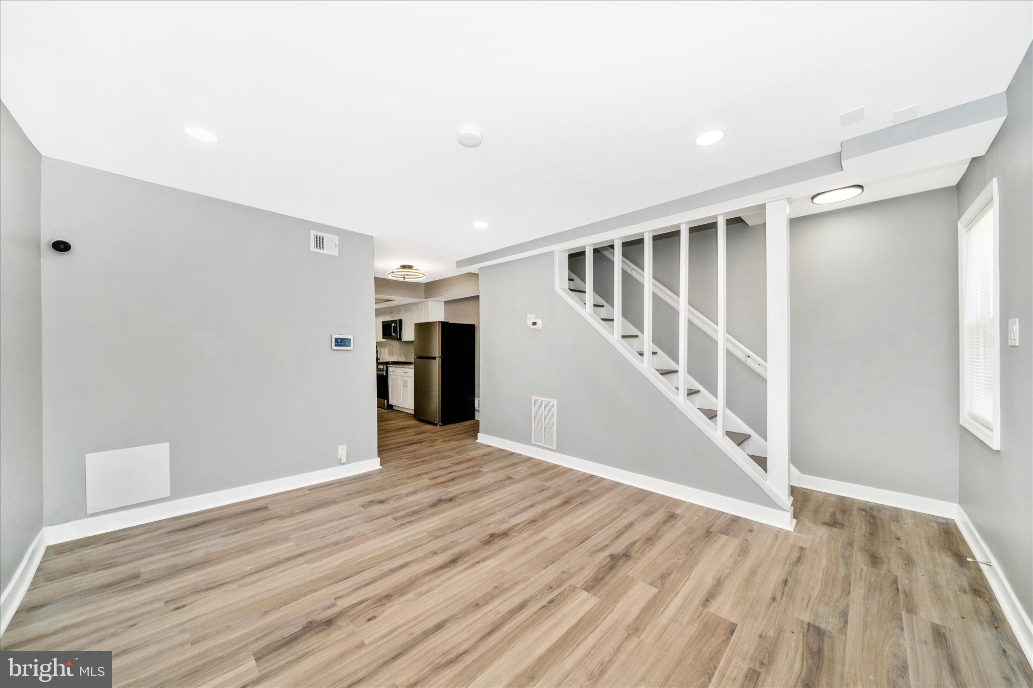 5027 Benning Road Southeast Washington, DC 20019 - Photo 9 of 57 a view of entryway with wooden floor