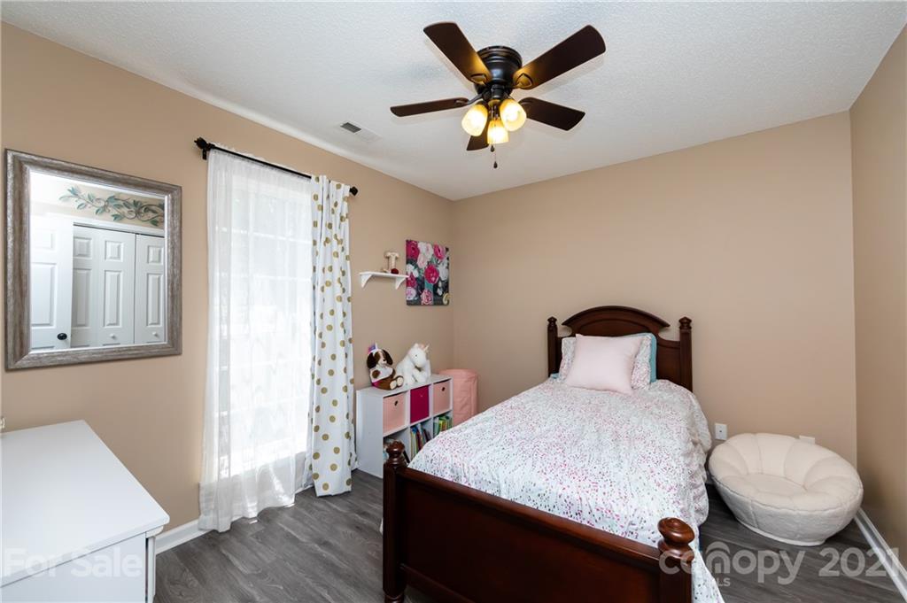 11207 Gold Pan Road Charlotte, NC 28215 - Photo 13 of 19 a very nice looking room with a large window
