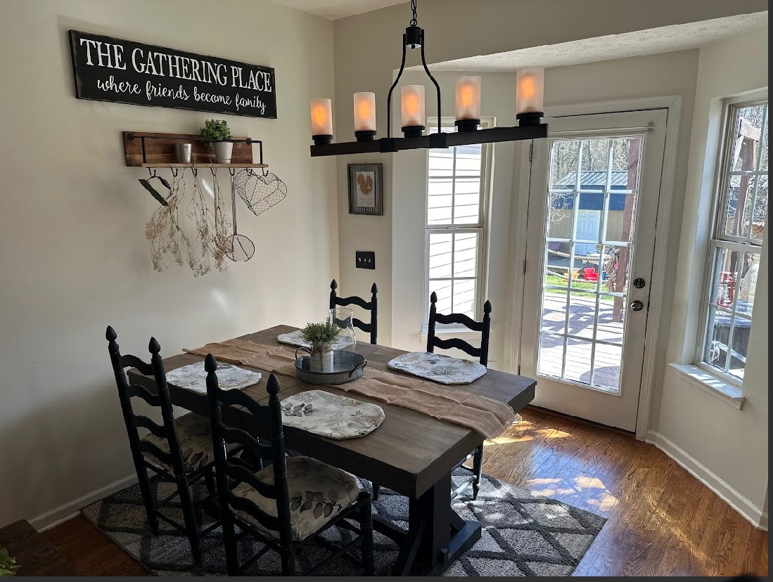 495 Calista Road White House, TN 37188 - Photo 11 of 28 a view of a dining room with furniture and window