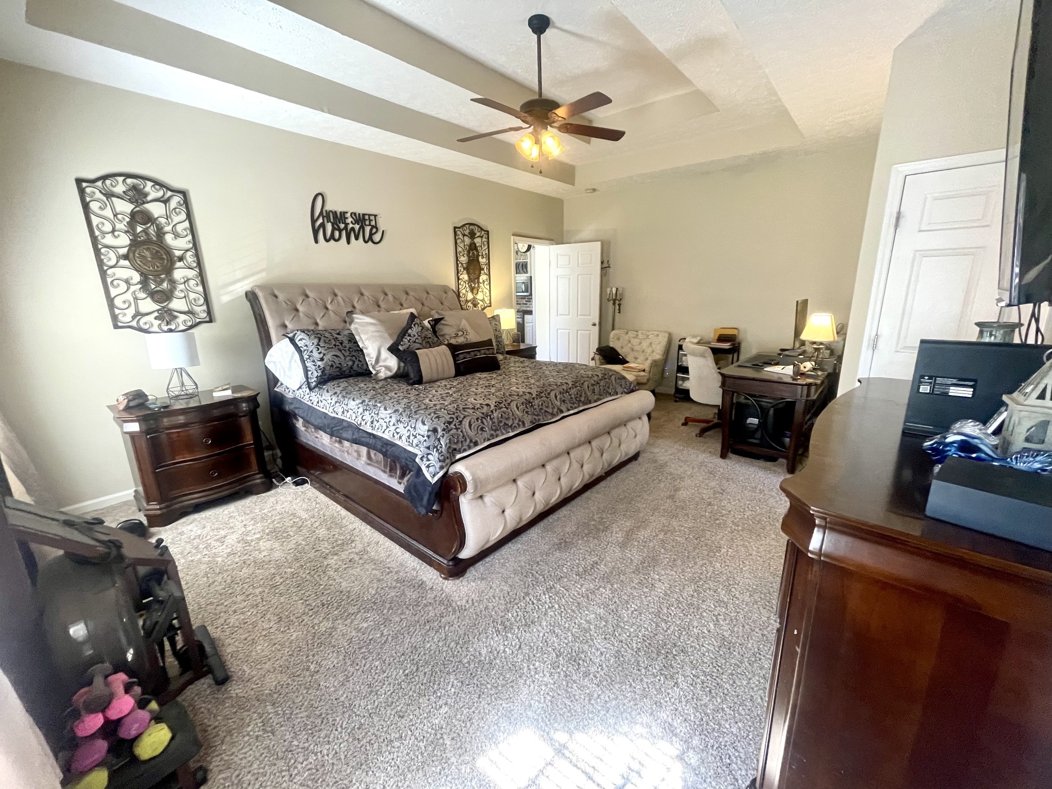 495 Calista Road White House, TN 37188 - Photo 18 of 28 a spacious bedroom with a bed couch and a window
