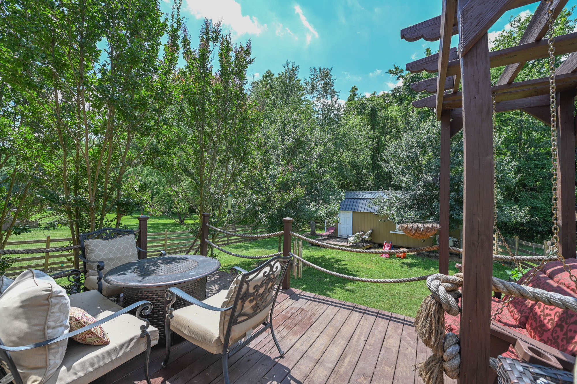 495 Calista Road White House, TN 37188 - Photo 2 of 28 a view of a chairs and table in patio with a yard