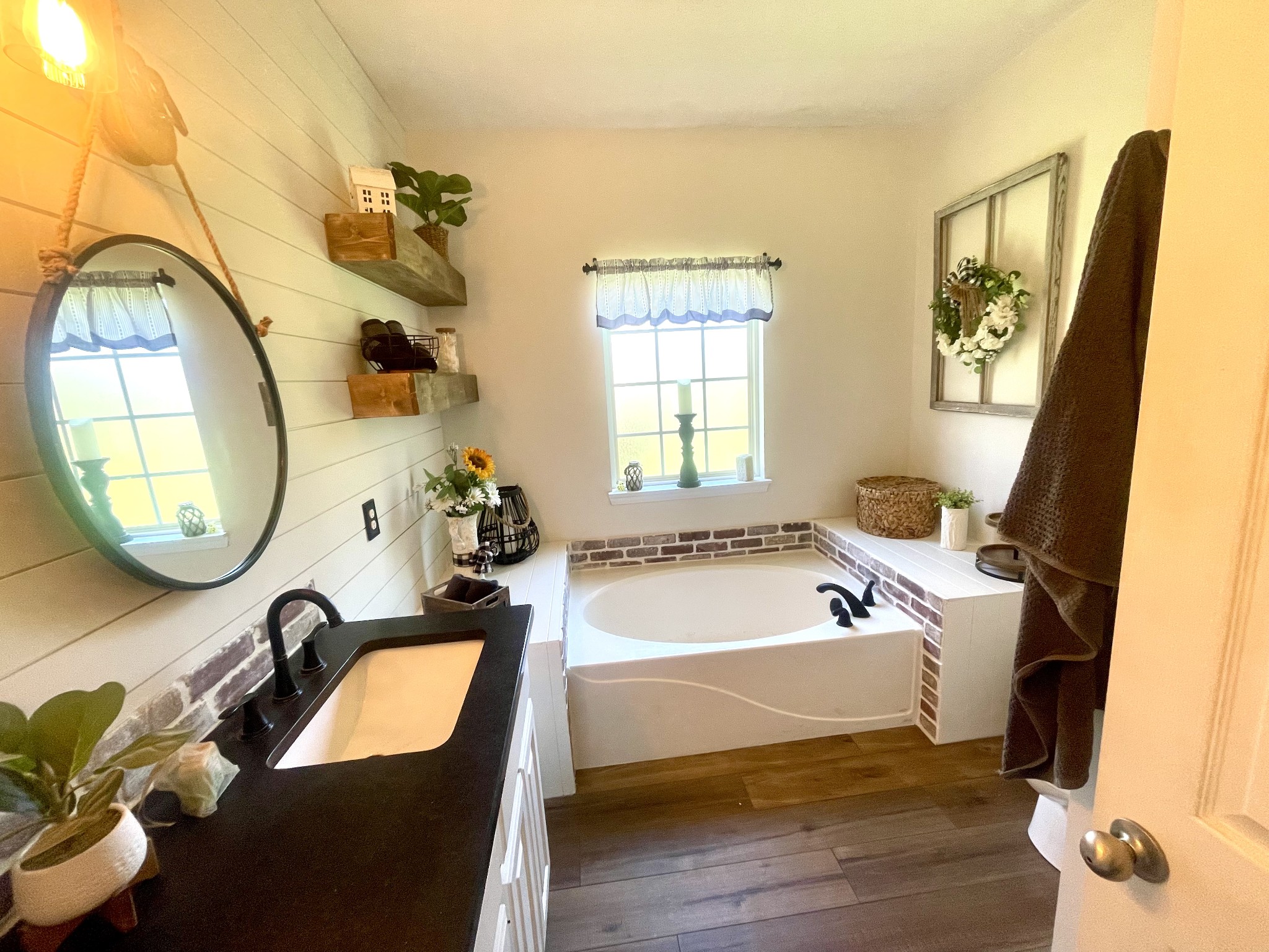 495 Calista Road White House, TN 37188 - Photo 23 of 28 a bathroom with a tub sink and mirror