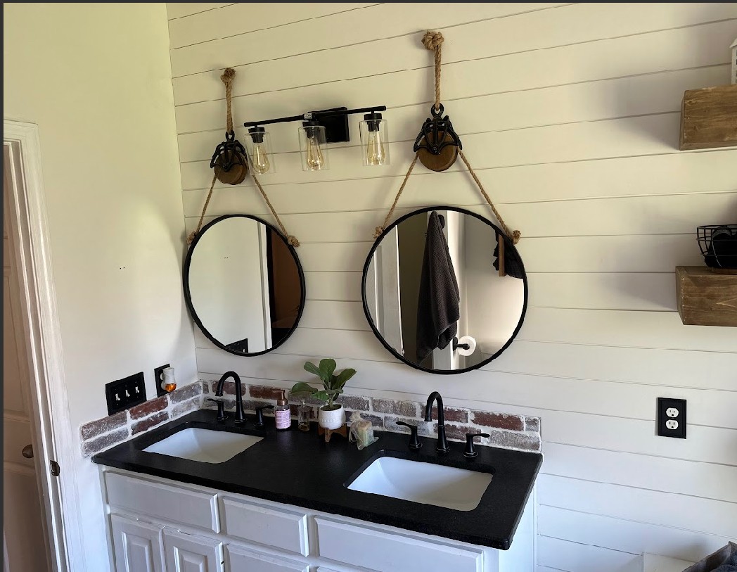 495 Calista Road White House, TN 37188 - Photo 24 of 28 a bathroom with a sink and a mirror