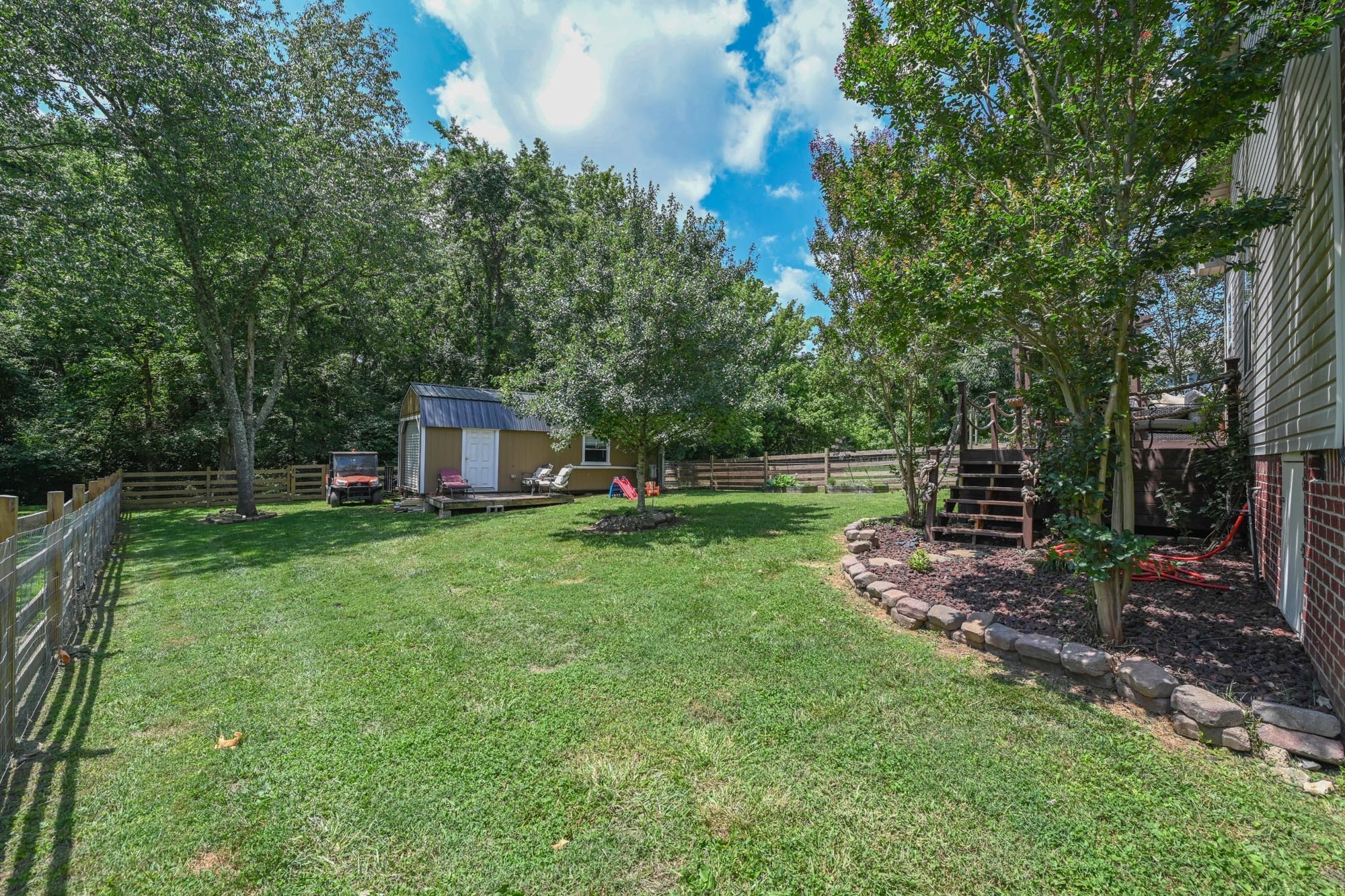 495 Calista Road White House, TN 37188 - Photo 28 of 28 a view of a house with backyard and a tree