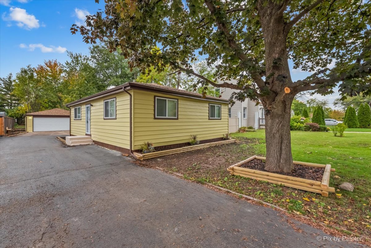 288 North Addison Road Wood Dale, IL 60191 - Photo 1 of 23 a view of a house with a yard