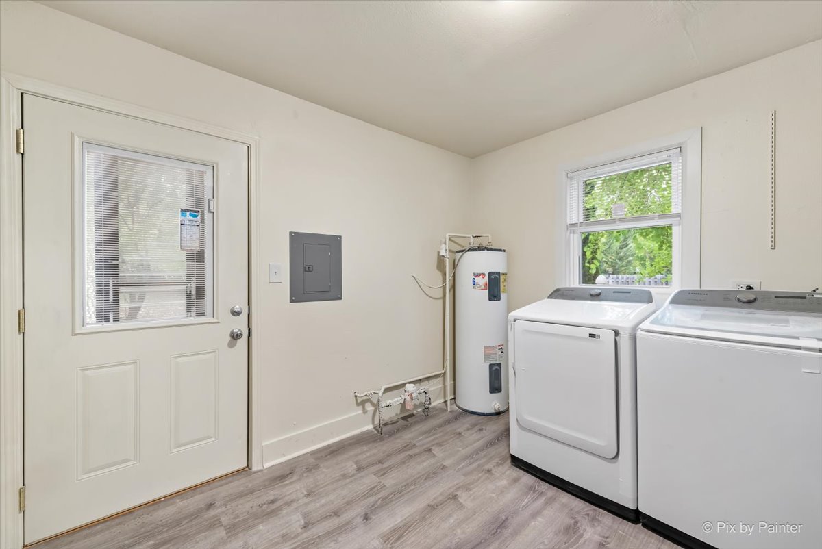 288 North Addison Road Wood Dale, IL 60191 - Photo 16 of 23 a view of storage and utility room with washer and dryer