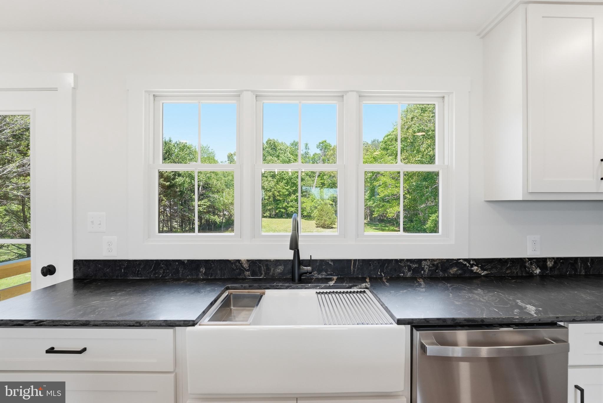1548 James City Road Reva, VA 22735 - Photo 16 of 48 a kitchen with a sink and a window