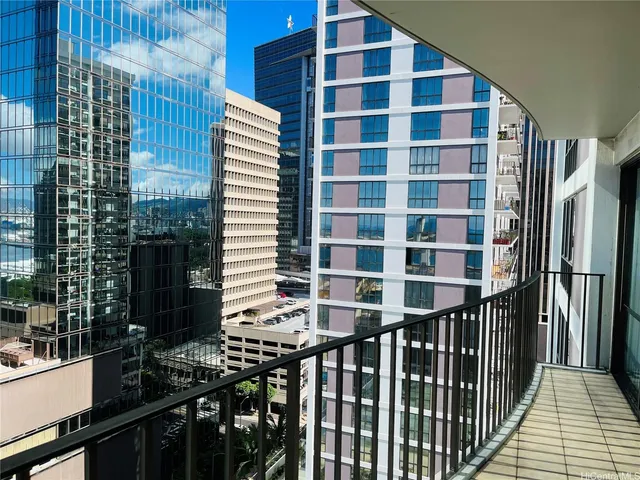 a view of a balcony with chairs